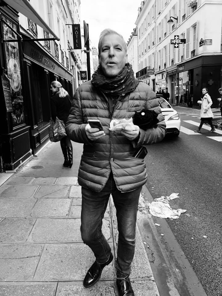 Kevin Barry Love said the Hanks Campaign was "broke" and couldn't pay workers. A few weeks later, he's strolling the streets of Paris.