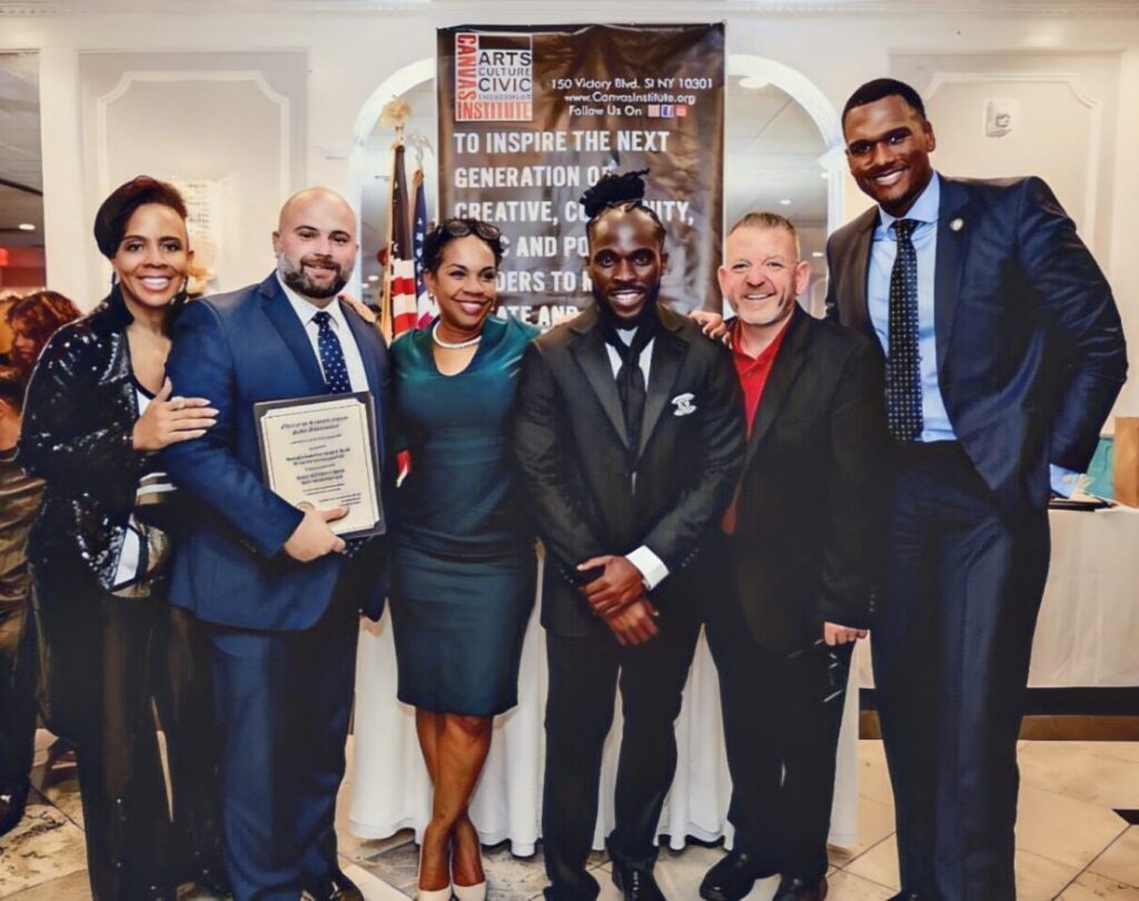 Tabacco claims that Reilly is "too cozy" with the Staten Island Uni-Party.