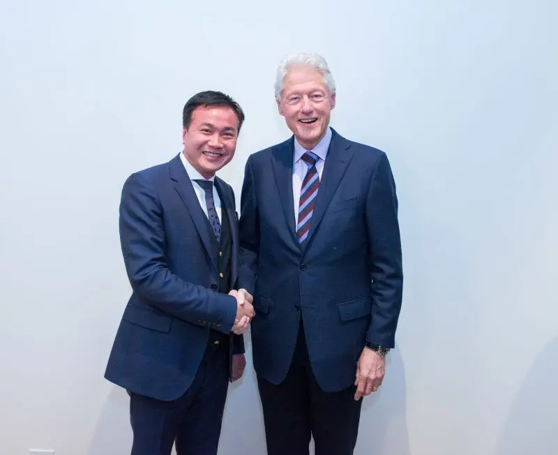 Zhu and Bill Clinton